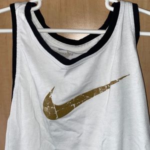 This is a very cute athletic nike shirt! It is great for activities.